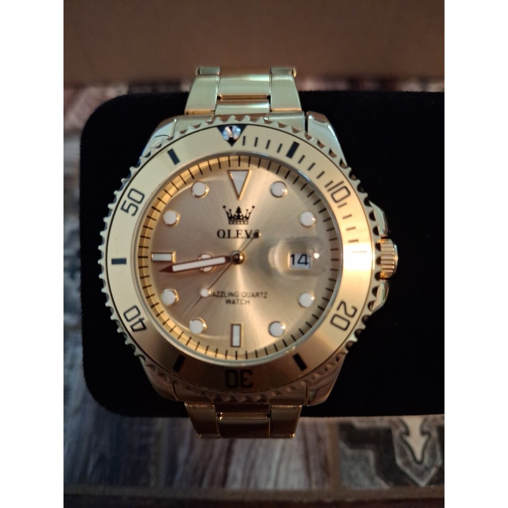 OLEVS 5885G 43mm Polished Goldtone Mens Watch,Day Indicator,Quartz Movement.
